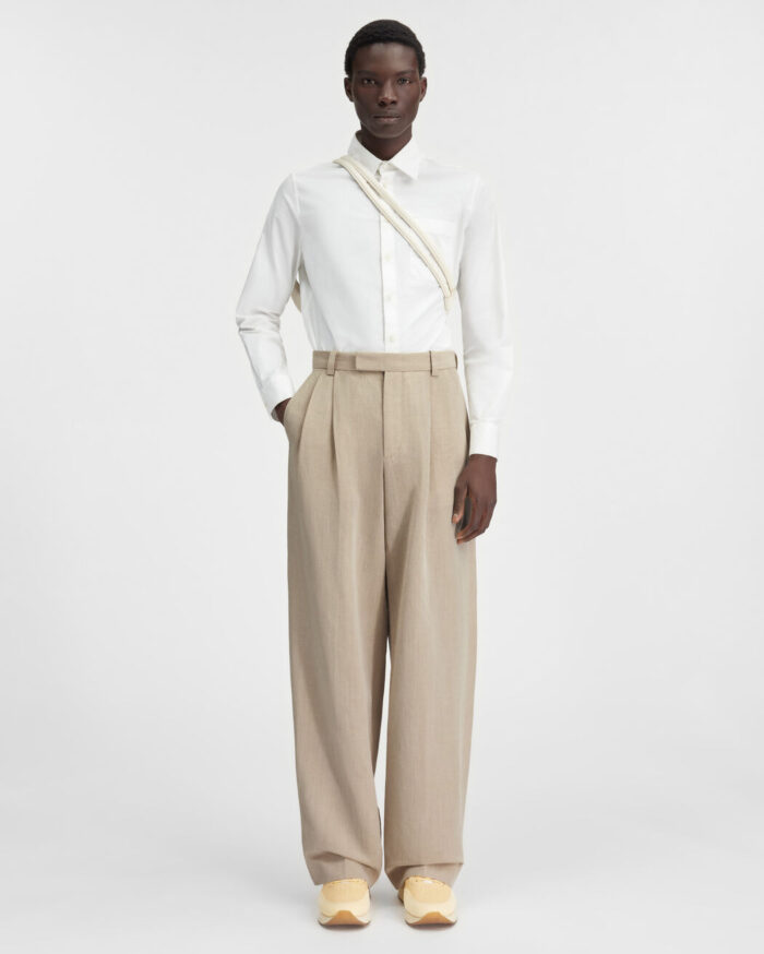 Le pantalon Titolo/Beige Color Loose pants.