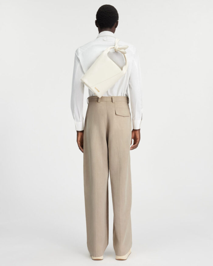 Le pantalon Titolo/Beige Color Loose pants.